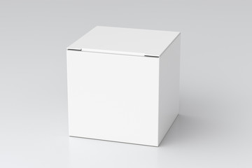blank white cube gift box with closed hinged flap lid on white background. clipping path around box 