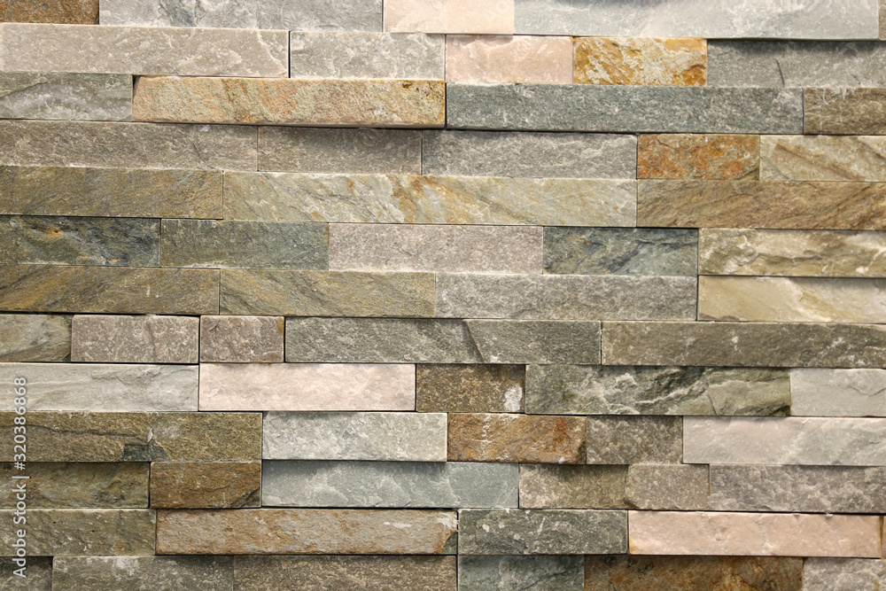 Masonry with natural stone cladding Stock Photo | Adobe Stock