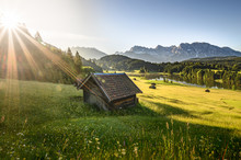 Idyllic Alpine Hut At Sunrise In Bavaria, Allgäu, Germany