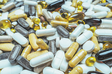 Wall Mural - Lot of medicine pills, tablets and dietary supplement capsules, macro shot, close up, toned