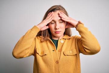 Sticker - young beautiful blonde woman wearing casual sweater over isolated white background suffering from he