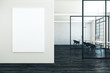 © peshkova - Modern coworking office with empty poster