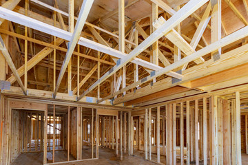 Canvas Print - Interior with wood framing beam of new house under construction beam wood