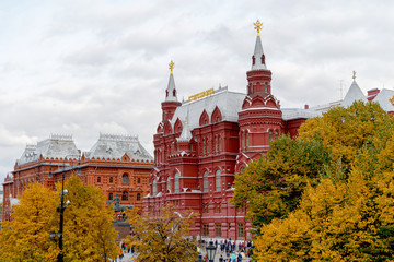 Wall Mural - Russia, Moscow October 2019. View of the Moscow Kremlin. People walk in the Alexander Garden near the Kremlin. Famous sights of Moscow and Russia.