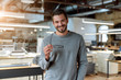 © Svitlana - Dont be a dull and boring one. Young businessman posing in office