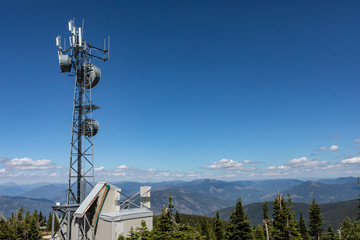 Telecommunications tower located high up on the hilltop of Kootenay valley mountains, in Creston, British Columbia, Canada