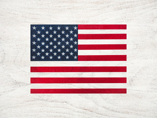 American Flag lying on the table. Place for your inscriptions. Top view, close-up. National holiday concept