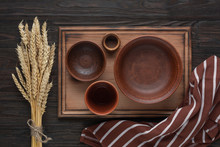 Pottery And Wooden Utensils, A Kitchen Napkin And Wheat Spikelets. Rustic Style