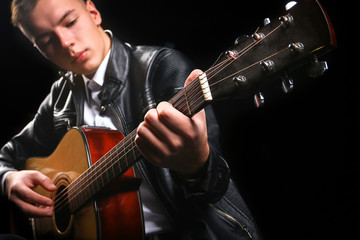 Wall Mural - Young men playing the guitar