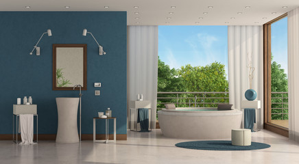 Wall Mural - Luxury bathroom with round bathtub and washbasin