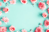 Fototapeta Mapy - Flowers composition. Rose flowers on blue background. Valentines day, mothers day, womens day concept. Flat lay, top view, copy space