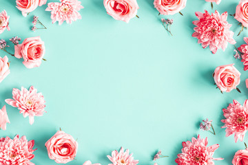 flowers composition. rose flowers on blue background. valentines day, mothers day, womens day concep