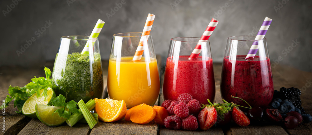 Selection of colorful smoothies and ingredients in glasses, rustic background - obrazy, fototapety, plakaty 