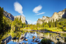 Scenic View Of Yosemite Valley With El Capitan Rock Formation Reflected In River, California, USA.