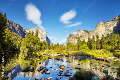 Scenic view of Yosemite Valley with El Capitan rock formation reflected in river, California, USA Canvas Print