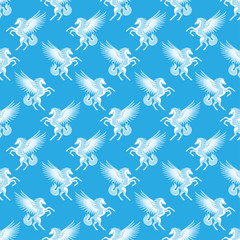 Sticker - Seamless pattern with white pegasuses on a blue background.