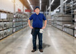 © sirastock - Portrait of male staff warehouse operator