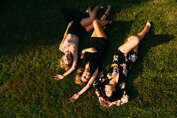 Wall Mural - top view of the girls with their eyes closed. beautiful poses. g