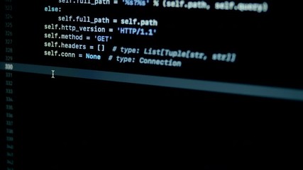 4.7 scroll and type python py programming code on laptop screen