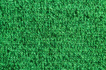 Wall Mural - Shiny green knitted wool background texture