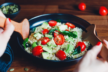 Wall Mural - Healthy salad with bulgur, avocado, spinach and cherry tomatoes.