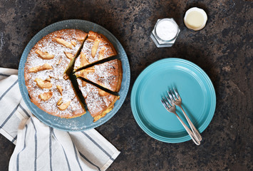 Wall Mural - Charlotte - a classic pie with apples on a concrete background.