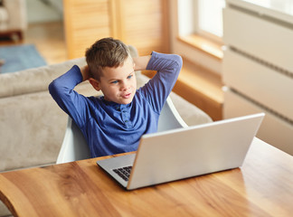 Wall Mural - child boy having fun tablet laptop  happy kid