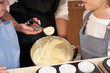 © PHILIPPE DEGROOTE/ADDICTIVE STOCK - Stock photo of a detail of a hand removing cream with a portioned Ice cream scoops