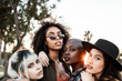 © Rafa Cortes/ADDICTIVE STOCK - Multiethnic group of female hipsters cuddling with each one