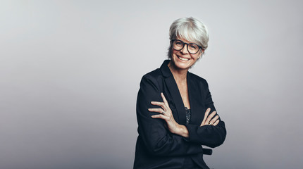 Smiling businesswoman in formal clothes