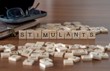stimulants concept represented by wooden letter tiles