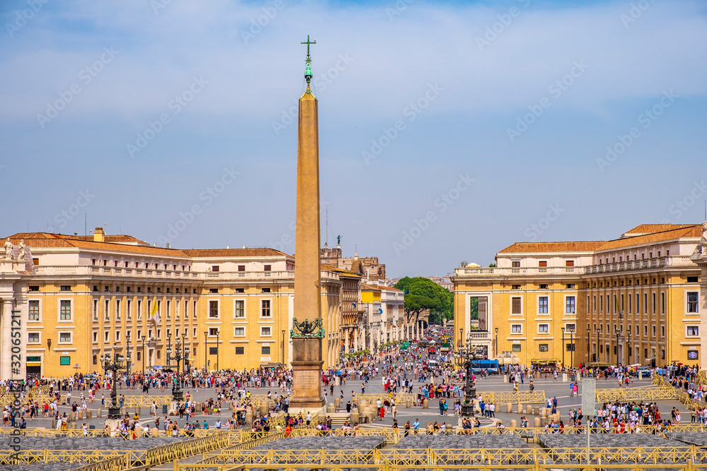 Rome, Italy - Panoramic view of the St. Peter’s Square - Piazza San Pietro - in Vatican City State, with the ancient Egyptian obelisk from Heliopolis, erected per order of pope Sixtus V - obrazy, fototapety, plakaty 