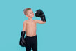 © Augustas Cetkauskas - Little kid in the boxing gloves, dreaming about victory, championship.