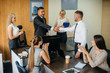 © Andrii - The Manager discusses business issues with his staff. Business, Finance