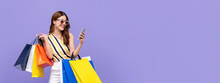 Beautiful Asian Woman Shopping Online With Mobile Phone On Banner Background