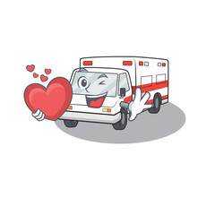 Sticker - Funny Face ambulance cartoon character holding a heart