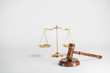 © Aerial Mike - Law symbols on bright background. Place for text.