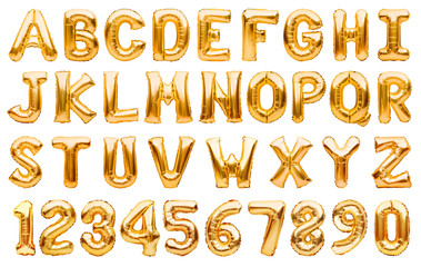 english alphabet and numbers made of golden inflatable helium balloons isolated on white. gold foil 