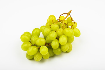 Wall Mural - Large green juicy grape on a white background. Flat lay. view from above. Place for writing. A bunch of green grapes