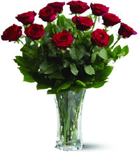 Bouquet Of Red Roses In Glass Vase Isolated On White