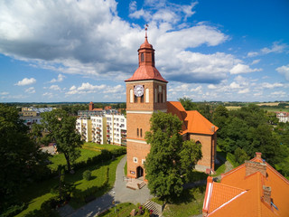 Sticker - Aerial view of Wegorzewo town, Poland (former Angerburg, East Prussia). Gothic style St. Peter and St. Paul's Church in the foreground