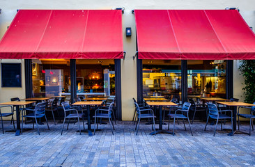 Wall Mural - table and chairs at a cafe