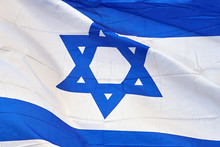 Background With A Real Israeli Flag Waving In The Wind Close Up