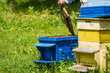 © Magdalena Ruseva - Beekeeping - Beekeeper checking hive