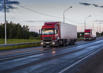 Poster - Trucks Semi-trailers Transporting cargo on a suburban highway