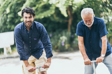 Wall Mural - The happy father and son greeting outdoor