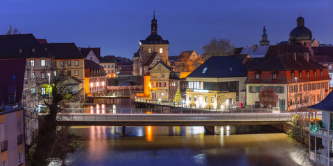 Fototapete - Aerial panoramic view of Old town hall or Altes Rathaus with bridges over the Regnitz river at night in Bamberg, Bavaria, Upper Franconia, Germany