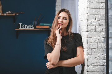 Wall Mural - Beauty woman with white perfect smile looking at camera at home