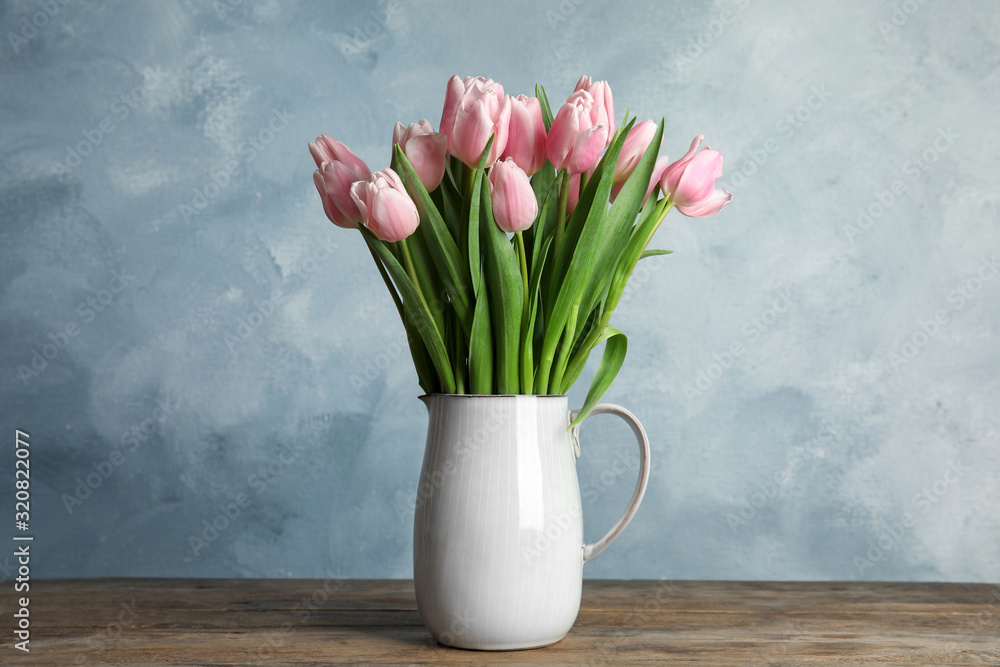 Beautiful pink spring tulips in vase on wooden table - obrazy, fototapety, plakaty 