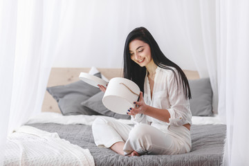 Beauty woman with white perfect smile looking at camera at home